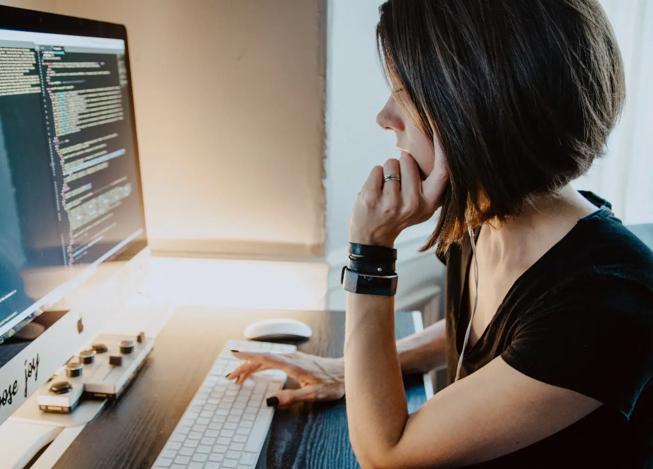 Woman working in front of a computer